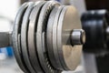 Close up of free weights on a rack in a gym. Royalty Free Stock Photo