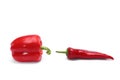 Two Different types of fresh red peppers isolated on a white background Royalty Free Stock Photo