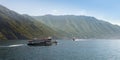 Two different ways to cross Lake Como with boats