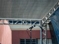 Two digital microphones on stage facing each other under a canop Royalty Free Stock Photo