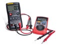 Two digital multimeters for electronics with probes. Black and red color. Whith red and black wires Royalty Free Stock Photo