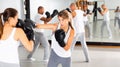 Two women boxing sparring in the gym