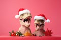 Two dinosaurs Rex in red Santa Claus hat holds golden gift box in its paws on pink background New Years Eve or Christmas Eve Art h Royalty Free Stock Photo