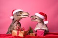 Two dinosaurs Rex in red Santa Claus hat holds golden gift box in its paws on pink background New Years Eve or Christmas Eve Art h Royalty Free Stock Photo