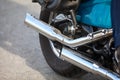 Two direct exhaust pipes on chopper motorcycle, chrome loud sound silencer