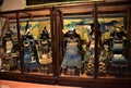 Two display cases each, three wonderful and ancient samurai costumes, in a room of villa Stibbert, in Florence.