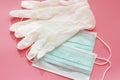 Two disposable medical masks and a pair of latex gloves Royalty Free Stock Photo