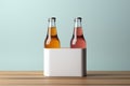 Two diverse nonalcoholic drink bottles with a white paper box on a Toscha background