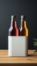 Two diverse nonalcoholic drink bottles with a white paper box on a Toscha background