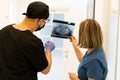 Two doctors checking x-ray image in hospital, high quality photo