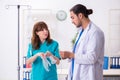 Two doctors colleagues working in the hospital Royalty Free Stock Photo