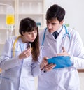 Two doctors discussing plasma and blood transfusion Royalty Free Stock Photo