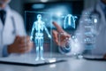 Two doctors engage in a discussion using advanced technology to analyze virtual health data about a patients body. The scene takes Royalty Free Stock Photo