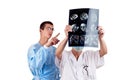 Portrait of two doctors examining a head tomography