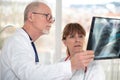 Two doctors examining x-ray report Royalty Free Stock Photo