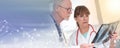 Two doctors examining x-ray report; panoramic banner Royalty Free Stock Photo