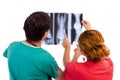 Two doctors having medical consultation of x-ray image. Royalty Free Stock Photo