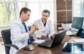 Two doctors having medical council in hospital. Discussing medical issues Royalty Free Stock Photo