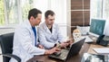 Two doctors having medical council in hospital. Discussing medical issues Royalty Free Stock Photo