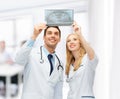 Two doctors looking at x-ray Royalty Free Stock Photo