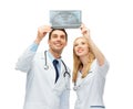 Two doctors looking at x-ray Royalty Free Stock Photo