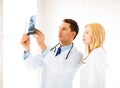 Two doctors looking at x-ray Royalty Free Stock Photo