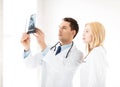 Two doctors looking at x-ray Royalty Free Stock Photo