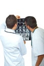 Two Doctors Men Examine Magnetic Resonance