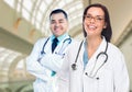 Two Doctors or Nurses Inside Hospital Building Royalty Free Stock Photo