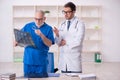 Two male doctors radiologists working in the clinic