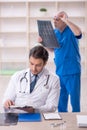 Two male doctors radiologists working in the clinic