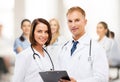 Two doctors with stethoscopes Royalty Free Stock Photo