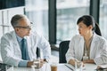 Two Doctors Talking in Meeting Royalty Free Stock Photo