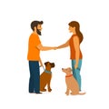 Two dog owners training their pets to sit close behave when meeting greeting