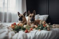 two dogs laying on a bed with tulips and flowers