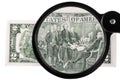 Two-dollar bill increased magnifying glass Royalty Free Stock Photo