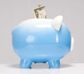 Two Dollar Bill Stuck in the Piggy Bank Royalty Free Stock Photo
