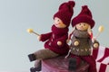 Two dolls boy and girl with christmas look Royalty Free Stock Photo