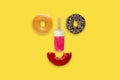 Two donuts with ice cream and bite half donut sets as the face. Royalty Free Stock Photo