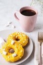 Two donuts with marshmallows and a cup of tea or coffee Royalty Free Stock Photo