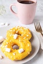 Two donuts with marshmallows and a cup of tea or coffee Royalty Free Stock Photo