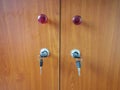 Two doors with keys, background Royalty Free Stock Photo