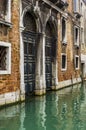 Two doors over the water in Venice Royalty Free Stock Photo