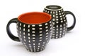 Two dotted coffee mugs