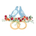 Two doves in flowers with wedding rings. Royalty Free Stock Photo