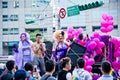 Two drag queens with muscle guy in the Taipei LGBTQIA pride, Taiwan. October 28, 2017.