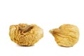 Two dried figs isolated on a white