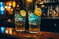 two drinks with ice and lemon slices on a bar counter Royalty Free Stock Photo