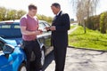 Two Drivers Exchange Insurance Details After Accident Royalty Free Stock Photo