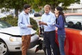 Two Drivers Exchange Insurance Details After Accident Royalty Free Stock Photo